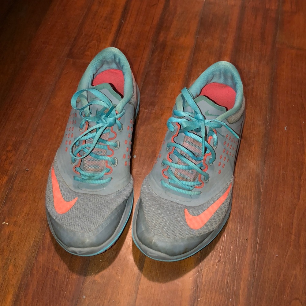 Gray women’s Nike running shoes